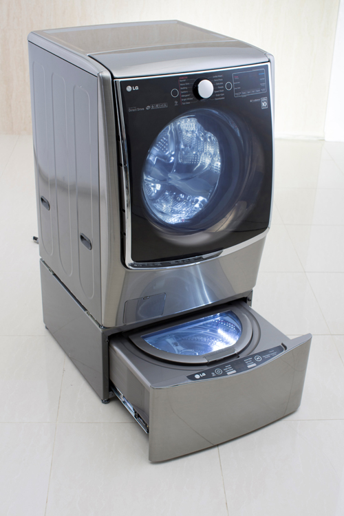 WITH TWIN WASH, LG TURNS HEADS WITH BOLD NEW WASHER DESIGN