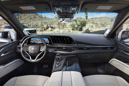 An image showing the front interior design of a Cadillac with LG’s infotainment system on show