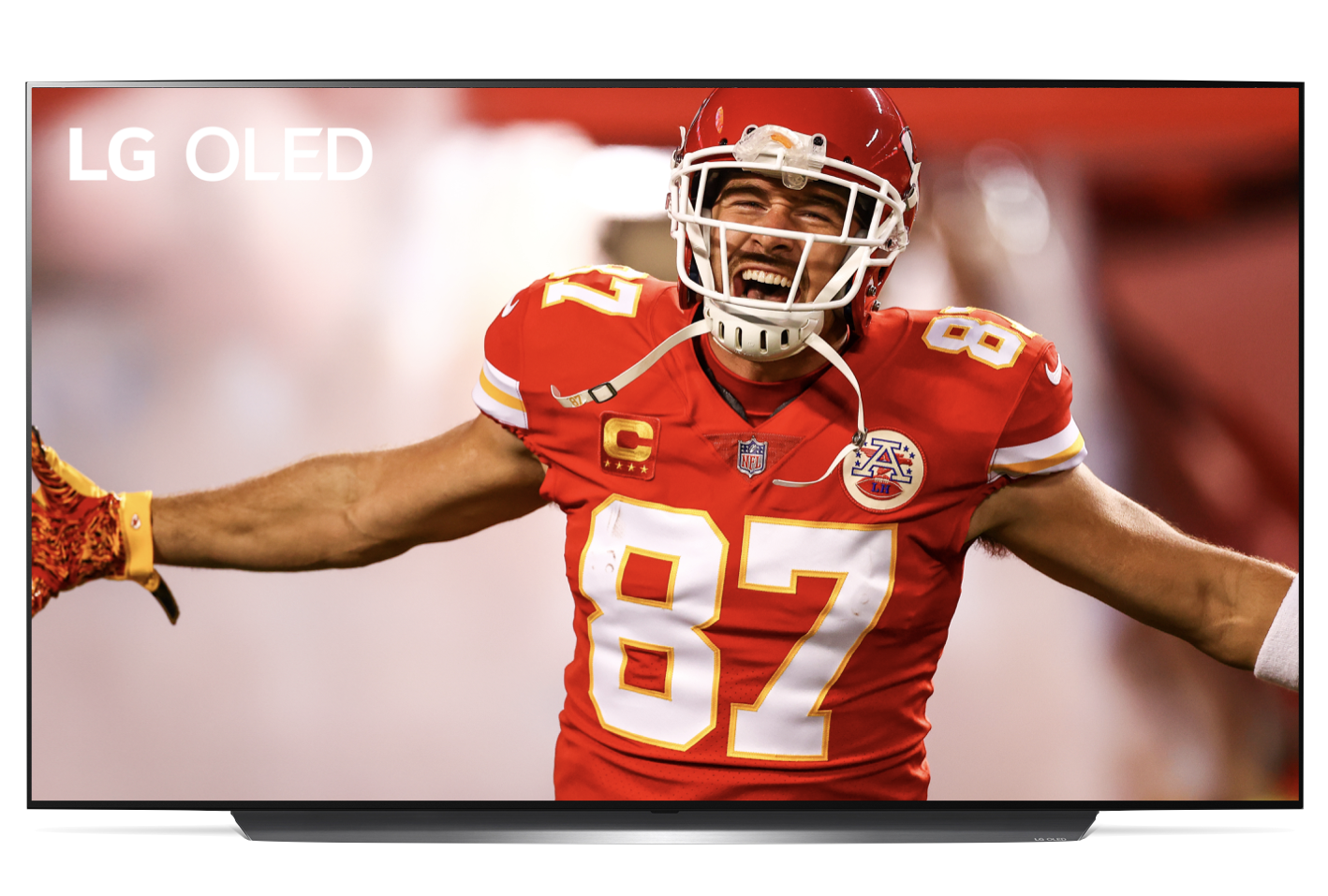 Image of Travis Kelce, Kansas City Chiefs’ tight end, celebrating a touchdown displayed on an LG OLED TV.