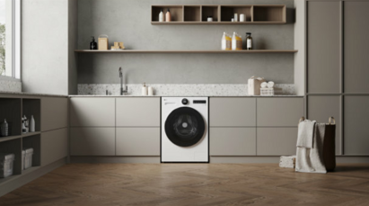 A picture of a kitchen with a washing machine built in