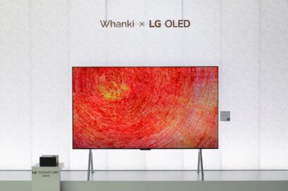 An LG OLED TV with a standing mount displays Kim Whanki’s artwork