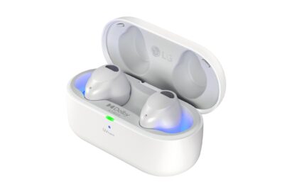 A pair of white LG TONE Free T90S earbuds sits inside a UVnano charging case