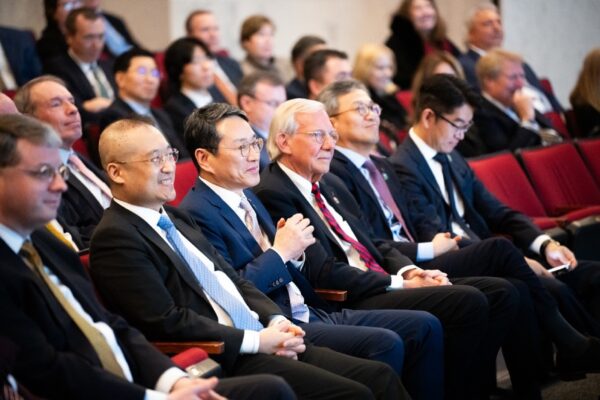 A photo of LG CEO William Cho, Sokwoo Rhee and others sitting next to each other