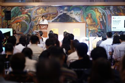 A photo of the presenter and the listening audience at the Old Senate Hall of the Philippines