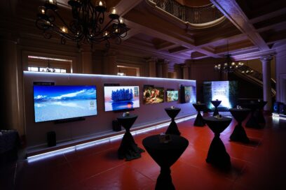 A photo of numerous screens of LG OLED TVs on display in the gallery
