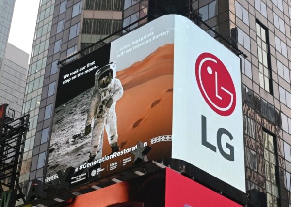 a photo of LG Hope Screen on the building with astronaut inside the screen 