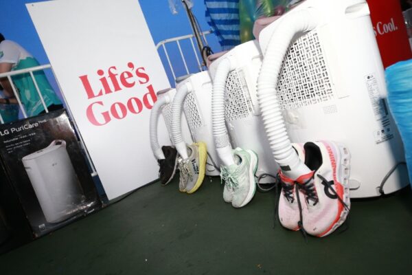 A photo of drying runner's shoes with LG products