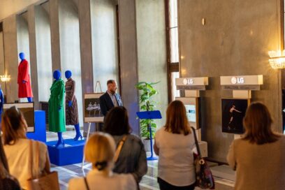 A photo of people looking at LG products on display at the Warsaw Grand Theater