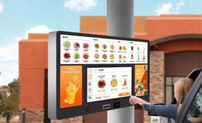 An illustrative image of a woman interacting with an outdoor digital menu board